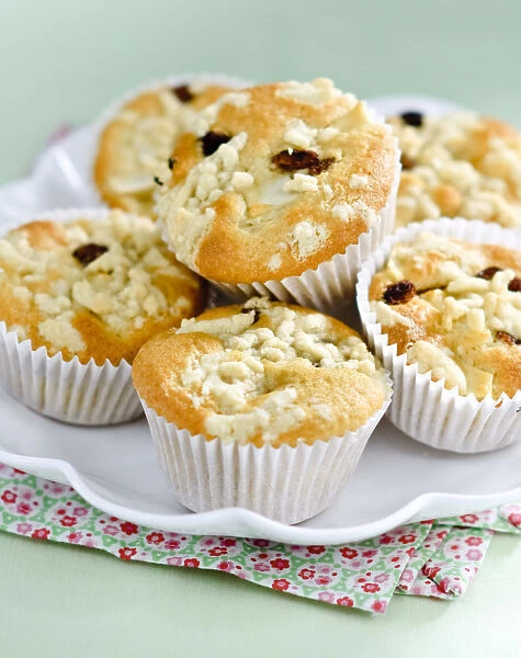 Apple struesel muffin in pile on white plate credit: Marie-Louise Avery  /  thePictureKitchen