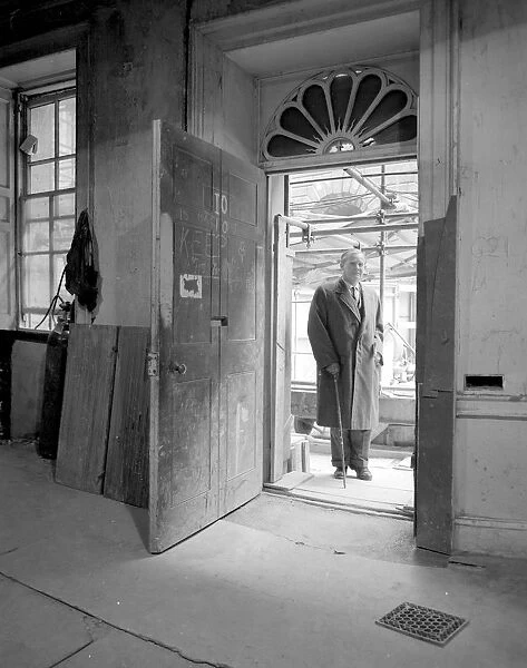 Architect Raymond Erith, in control of reconstruction work at No. 10 Downing Street