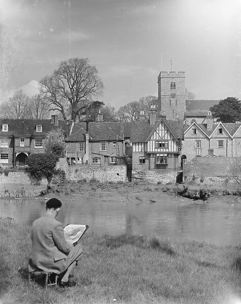 An artist at work by the river at Aylesford, Kent. 1935