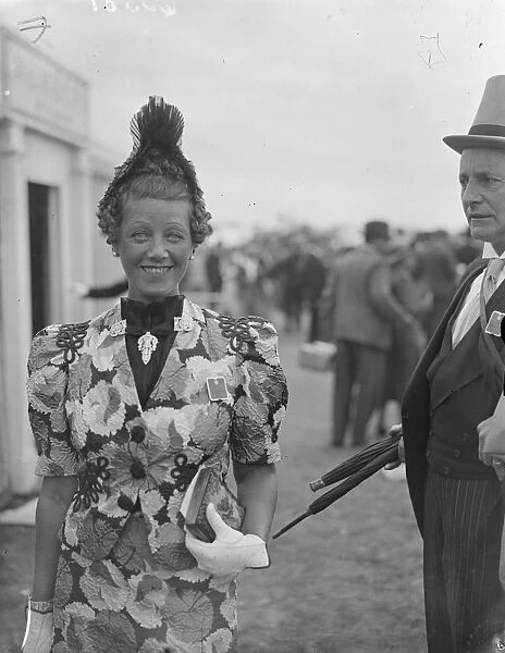 Ascot frills. Photo shows: a frilled hat fashion of unusual design worn by Mrs Philip