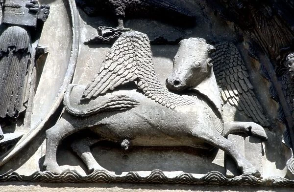 Ast. Sites Chartres The bull of Luke on the tympanum of the Royal Portal with the