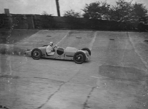 Attempt of diesel car records at Brooklands. Dr Reginald Munday is the new diesel