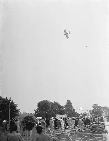 An Avro Avianat ( G-aWH ) gives a display to the crowd at the Dartford Carnival in Kent