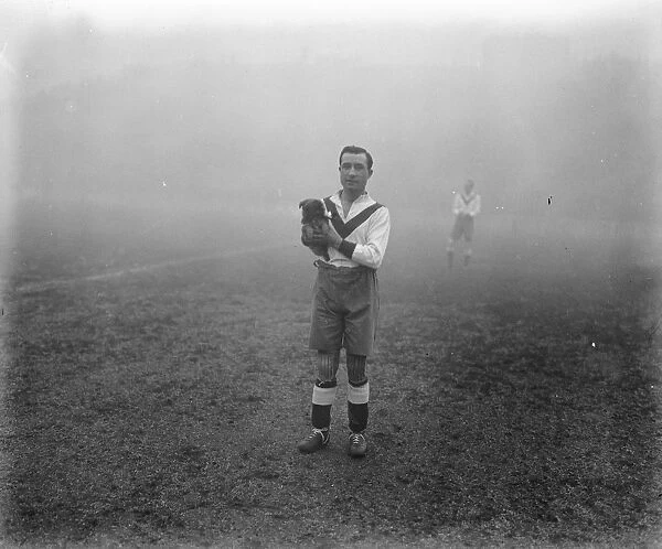 Bailey of the Clapton Orient with a mascot 13 January 1923