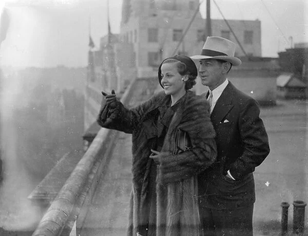 Barbara Kent, film star, and Harry Edington, the Hollywood business agent, arrive in London
