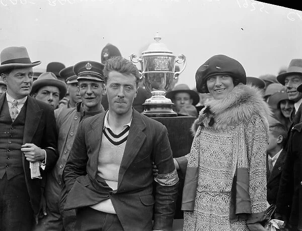 Barnard wins aerial derby. Captain Barnard photographed with his wife, and the