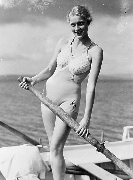 Bathing in brief. Plenty of air and sun for 1936 beach girl. That German woman