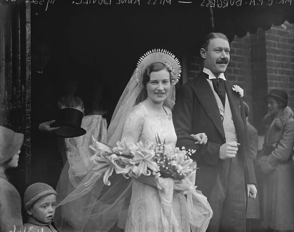 Beautiful brides striking head dress. The marriage of Miss Ann Bovill and Mr C P A Burgess