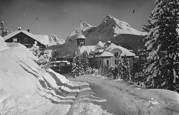 Where beauty is snow deep. This beautiful snow study is of Arosa. Switzerland