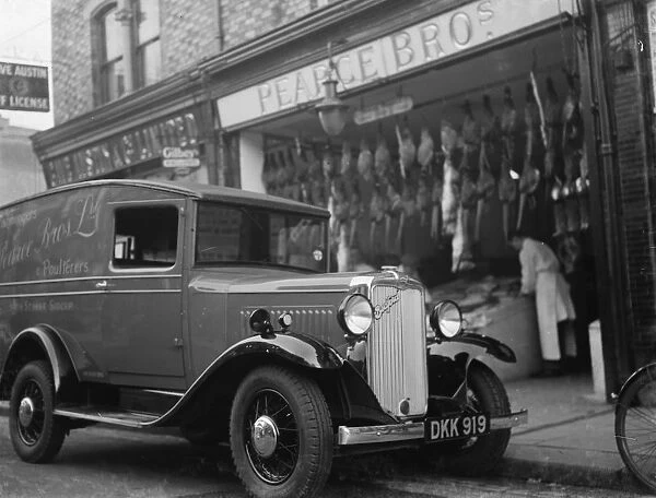 A Bedford truck belonging to Pearce Bros Ltd, the fishmongers and poulterers, parked