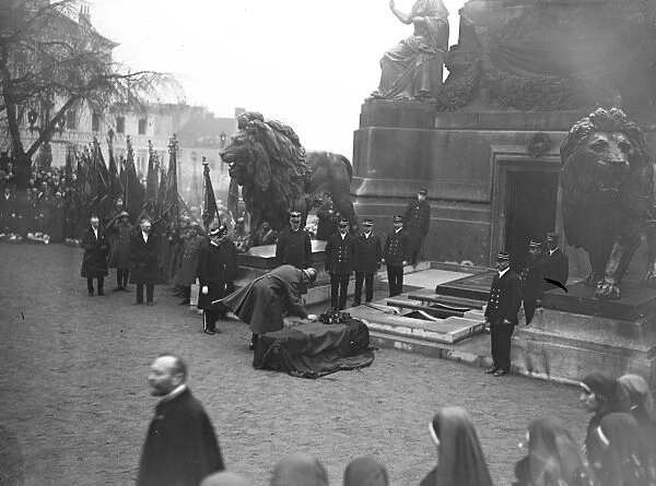 Belgiums unknown warrior. The King of the Belgians placing his medal on the coffin