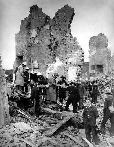 Bomb damage. Rescue squads in Hackney, East London, worked unceasingly under a