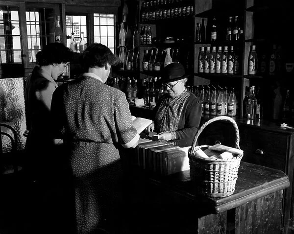 Books and groceries - a shop in the village of Chilham, Kent, becomes a public library once a week