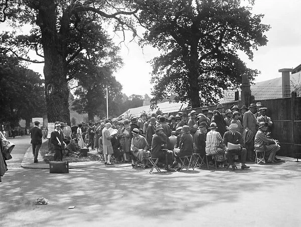Bound to be present at the jubilee. The characteristic queue at Wimbledon. 21