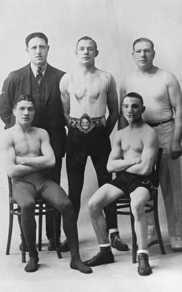 Boxers. Back row, centre; Ernie Izzard, Jack Goodwin, trainer. Front row; Johnny Brown