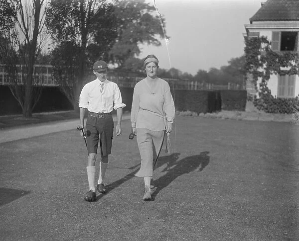 Boy and Girl Golfer A D Mathieson of Edinburgh Academy, the boy champion and Miss