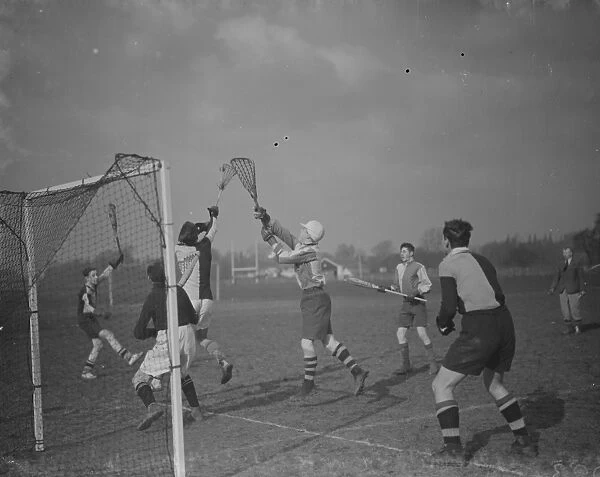 Boys playing Lacrosse at Sidcup County School, Kent. 12 February 1938