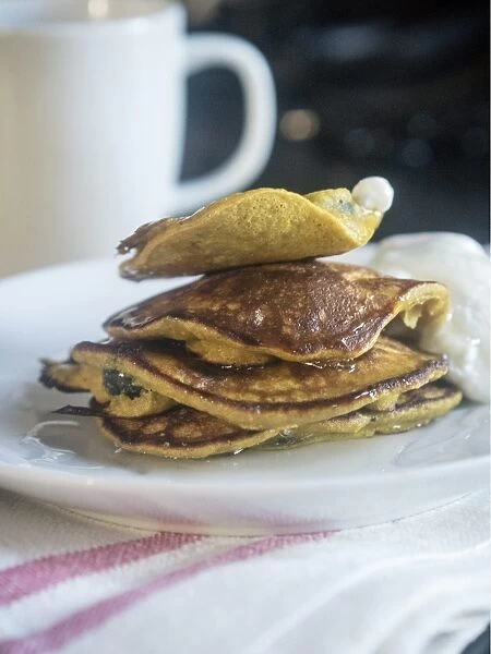 Breakfast pancakes made with a batter of a banana, two eggs, and 2 tablespoons of