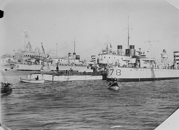 British warships on their way to China. HMS Aphis, river gunboat, alongside her escort