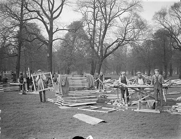 Building a town for Coronation troops in Kensington Gardens. Of wood and canvas