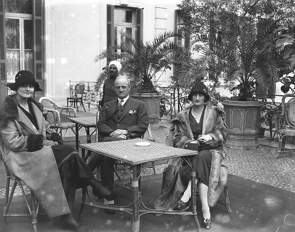 The Cairo Season, Egypt. On the terrace at the Shepheard Hotel, left to right