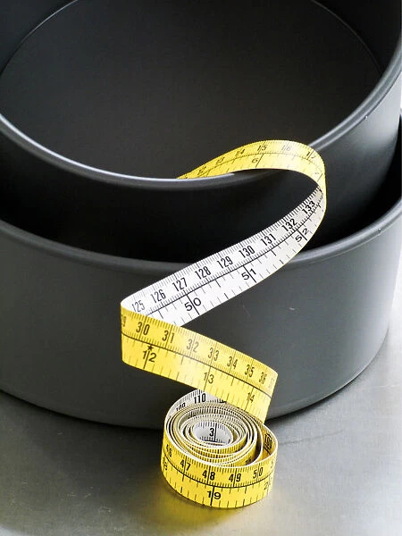 Cake tins and tape measure credit: Marie-Louise Avery  /  thePictureKitchen  /  TopFoto