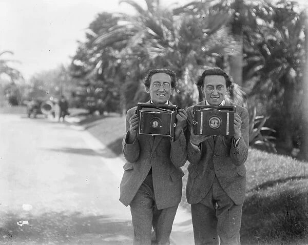 Cannes camera twins. Twin brothers at work with their cameras at Cannes. Their
