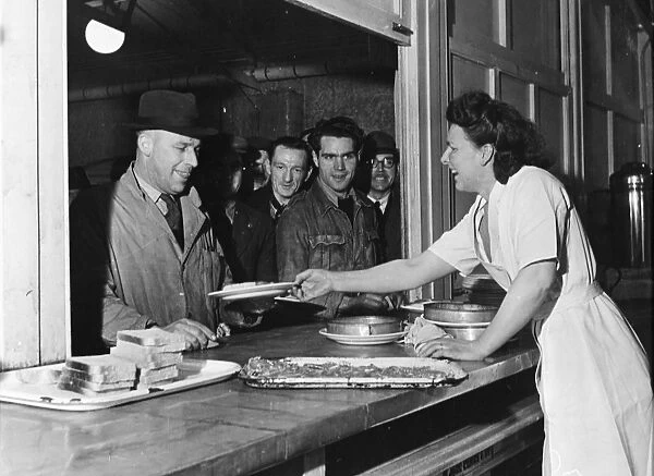 The canteen at the Austin Motor Works where workers queue up to be served. Longbridge