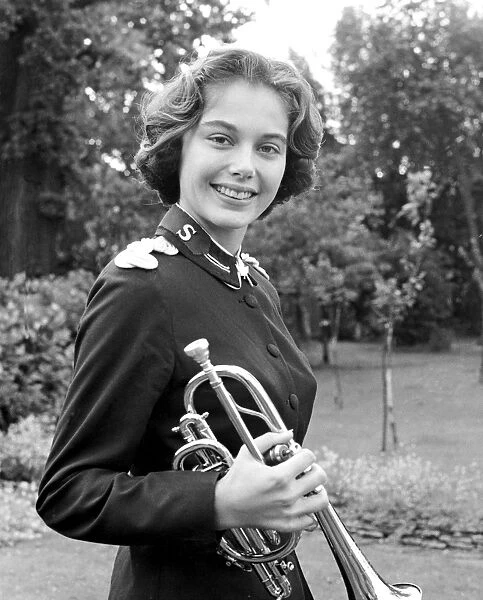 Carole Reinhart a 20 year old music student plays in a Salvation Army Band in Miami, Florida