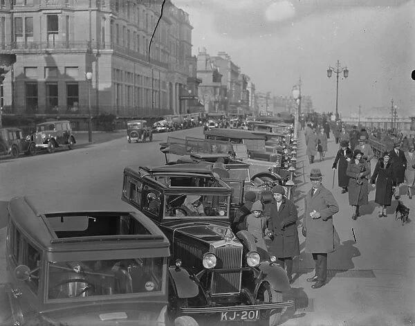 Cars parked along the front at Brighton. 27 March 1932