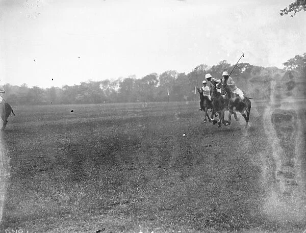 Chasing down the ball in a Polo match. 1935