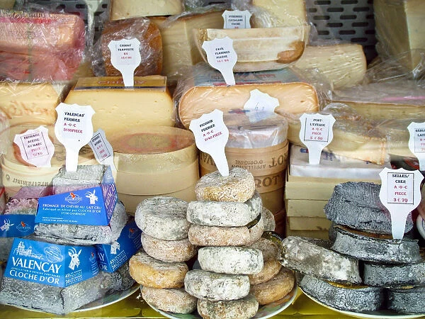 Cheese stall in market in Pas-de-Calais, northern France, selling inter al., Pont