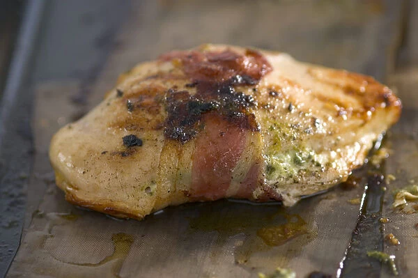 Chicken breast fillet wrapped with bacon and stuffed with spinach and ricotta cheese