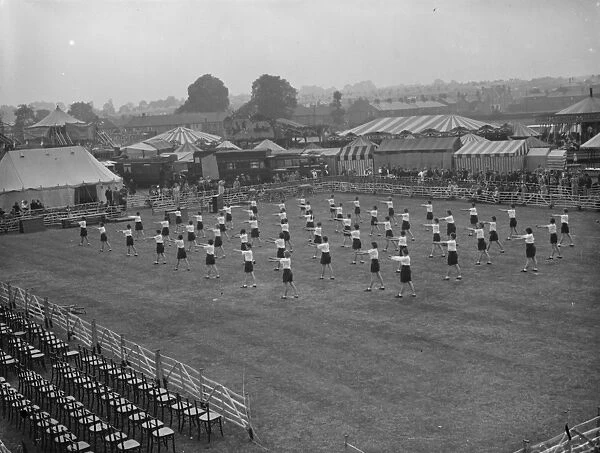 Children from Dartford Technical College in Kent perform a drill display in the main