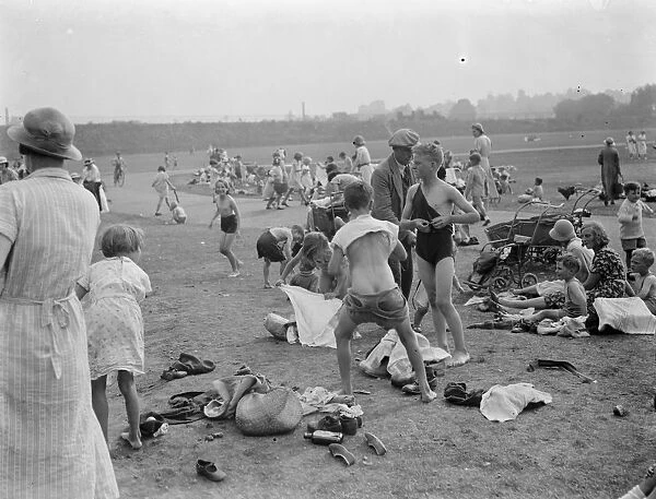 Children enjoying the paddling pool, Dartford, Kent. 1937