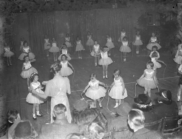 Children peforming a dance in Dartford, Kent. 1936