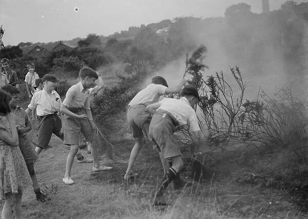 Children putting out fire, Dartford Heath. 1937
