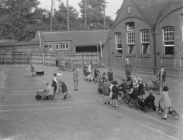 Children receive traffic instructions on the playground of their Sidcup Hill School