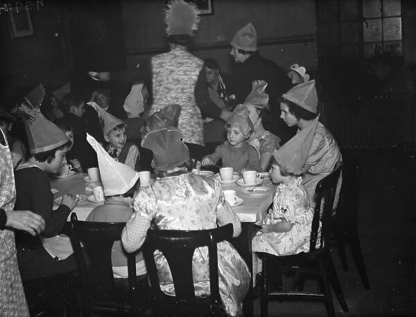 A childrens party at the Working Mens club in Sidcup, Kent. 1938