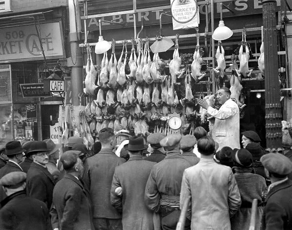Christmas, 1936. Auctioning the Christmas Turkey. 23 December 1936
