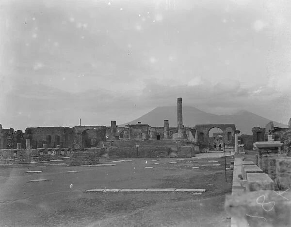 The civil forum in the city of Pompeii showing Vesuvius in the background February 1925