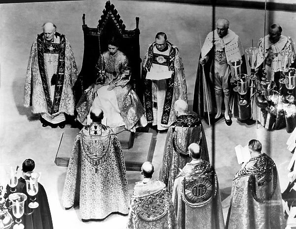 Coronation Day - The Queen dressed in the magnificent Royal Rose cloth of God receives