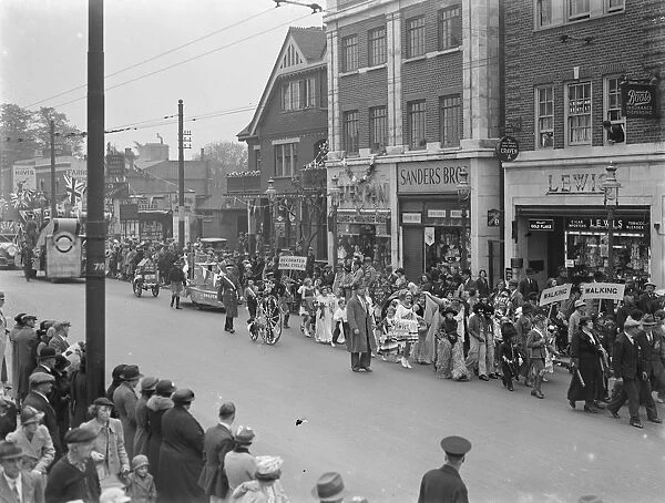Coronation festivities. Parade marching through the streets of Bexleyheath, Kent