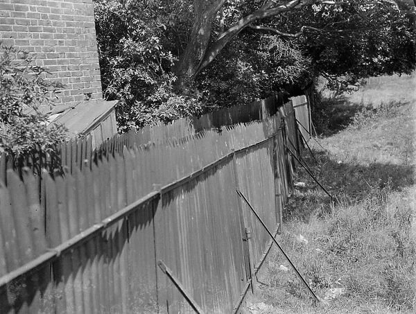 Corrugated iron fence at Darenth, Kent. 1935