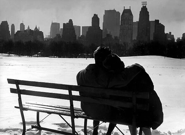 Couple enjoying the snow in Central Park New York 1962 love couple romance romantic