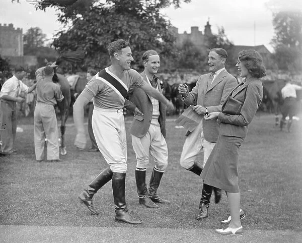 Cowdray Park Polo at Midhurst in Sussex. Sharing a joke, Captain Lord Louis Mountbatten