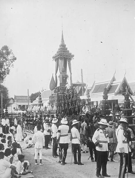 Cremation of late King of Siam. The golden urn in position on the great funeral car of state