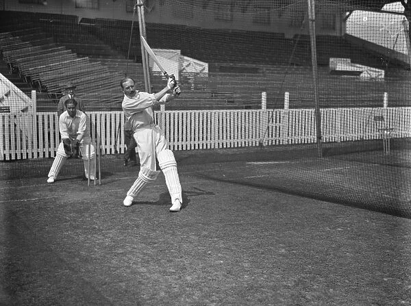 Cricket at the Oval. Percy Fender batting with Captain Barnato keeping wicket