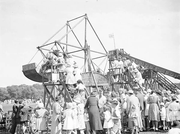 Crowds at the funfair at the Co - operative Sports at Dartford. 1937