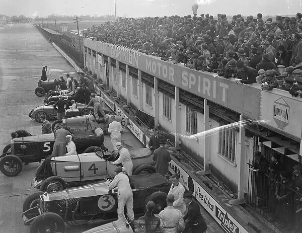 Crowds throng Brooklands for great Easter opening meeting. Easter holiday crowds
